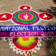 A rangoli welcomes voters to the all-women polling booth.